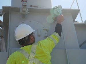 Employee working on transformer