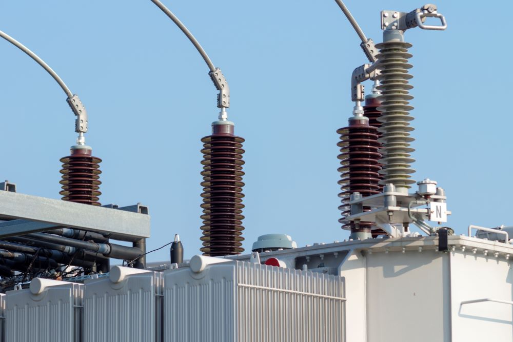 7view-of-high-voltage-insulators-on-a-clear-blue-sk-2023-11-27-04-57-07-utc High Voltage Insulators